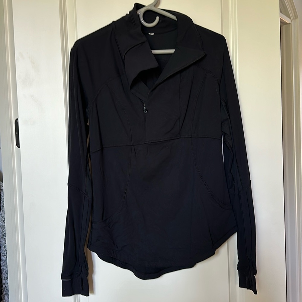 Asymmetrical 1/4 zip with kangaroo pocket and thumb holes
